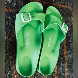 Eva Madrid in a limey green color.